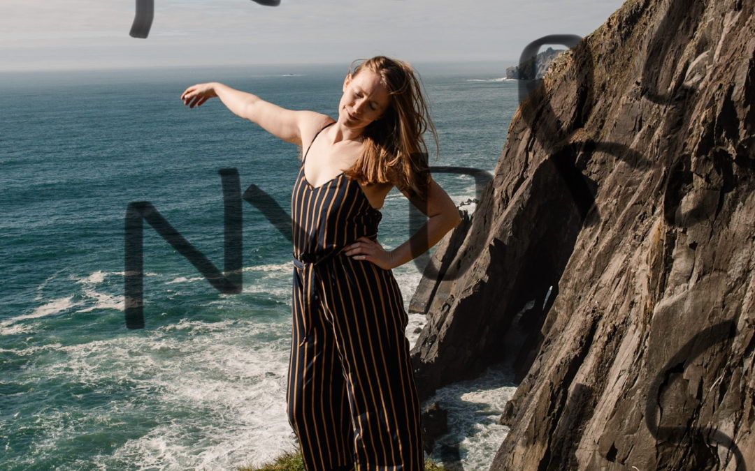 Lumalia standing near an ocean edge with her hand out and text over image that says "no more lies"