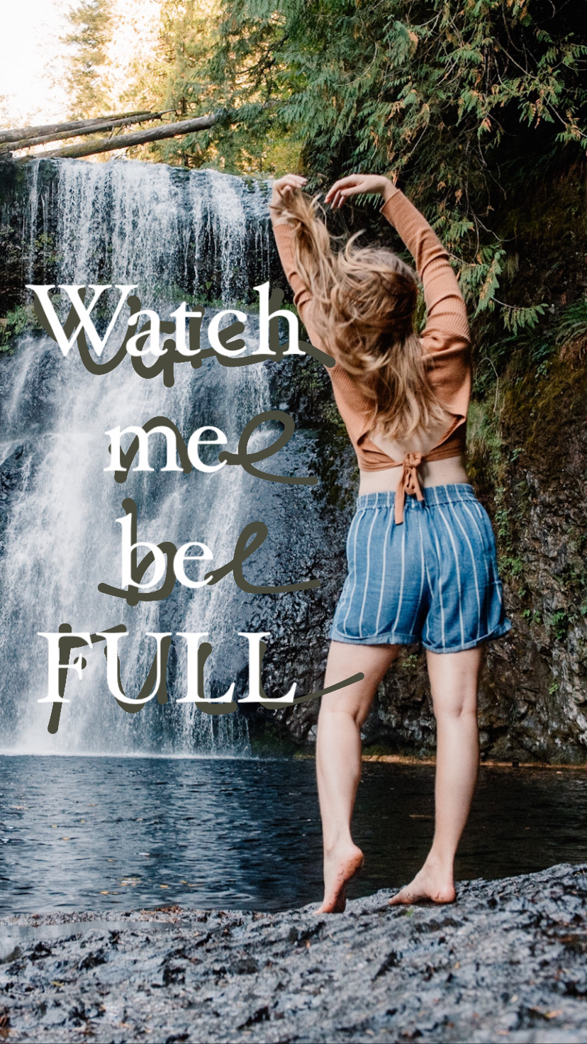 Lumalia standing near a waterfall with the text over that says "watch me be full"